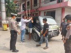 Polsek Minas Bagikan 100 Masker kepada Warga di Tengah Kabut Asap