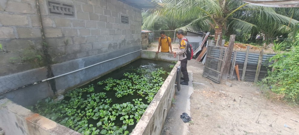 Bhabinkamtibmas Desa Kelawat Dukung Ketahanan Pangan Nasional Melalui Budidaya Kolam Ikan Nila